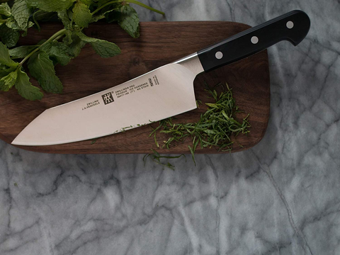 Image of ZWILLING Pro 7-Inch Rocking Santoku Knife, 7'', Black/Stainless Steel