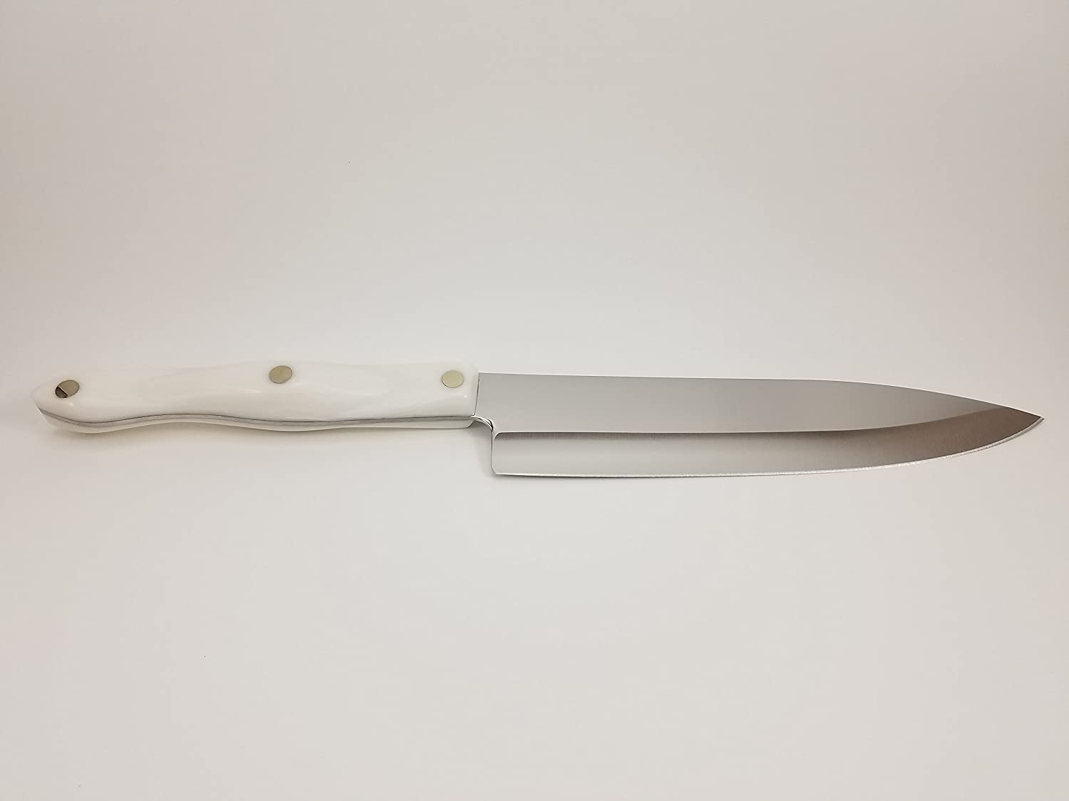 Model 1728 CUTCO White (Pearl) Petite Chef Knife in Factory-Sealed Plastic Bag. 7.75” High Carbon Stainless Blade and 5.5” Handle.