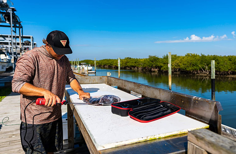 Image of Bubba 110V Electric Fillet Knife with Non-Slip Grip Handle, 4 Ti-Nitride S.S. Coated Non-Stick Reciprocating Blades, 8' Cord and Storage Case for Fishing