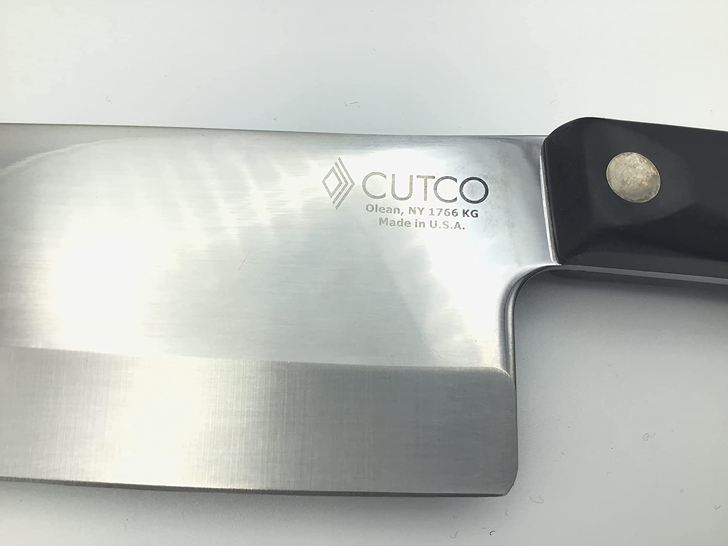 CUTCO Model 1766 Santoku Knife.......... 7.0" High Carbon Stainless Straight Edge Blade.............5.6" Classic Brown Handle (Sometimes Called "Black")....................In Factory-Sealed Plastic Bag.