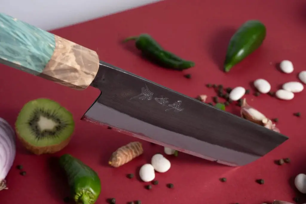 The Significance of Holding a Sushi Knife with One Finger on Top