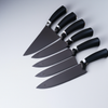 Are the knives in the New Home Hero 17 pcs Kitchen Knife Set serrated?