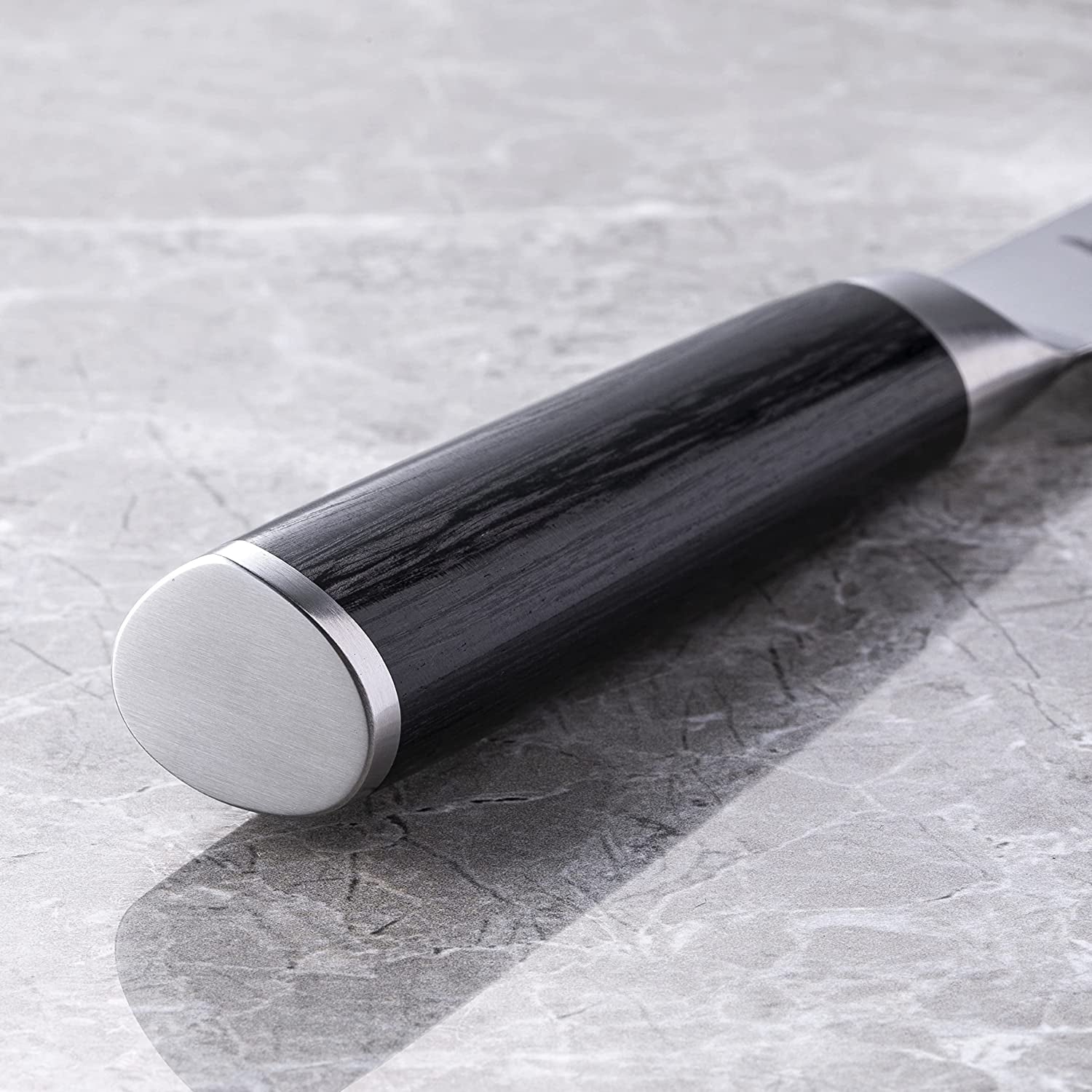 Classic 7” Hollow-Ground Santoku All-Purpose Kitchen Knife; VG-MAX Blade Steel and Ebony Pakkawood Handle; Hollow-Ground Indentations for Reduced Friction and Smoother Cuts; Handcrafted in Japan