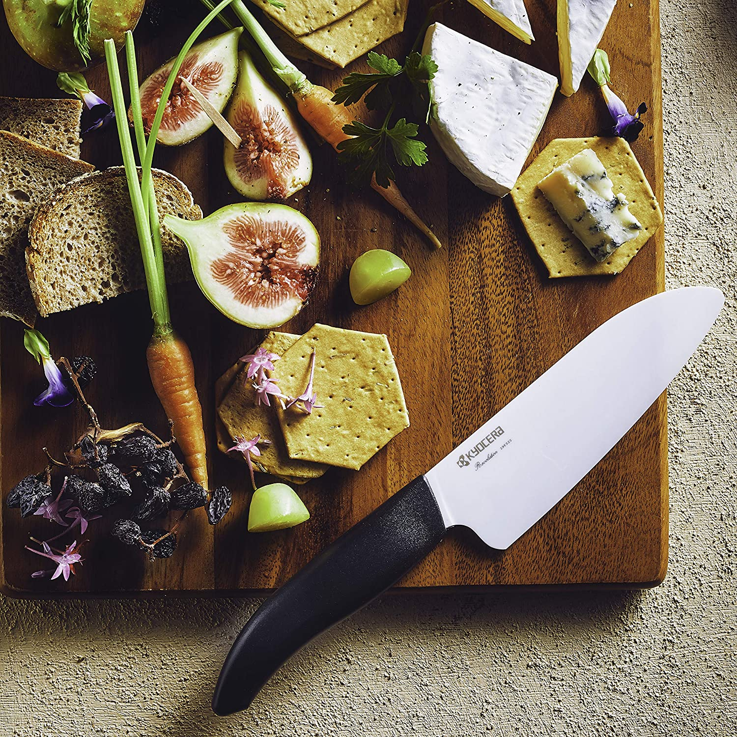 Kyocera Advanced Ceramic Revolution Series 5-1/2-Inch Santoku Knife, Black Handle, White Blade