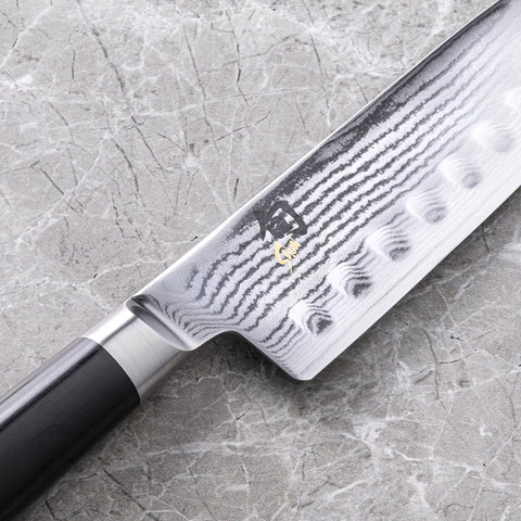 Image of Classic 7” Hollow-Ground Santoku All-Purpose Kitchen Knife; VG-MAX Blade Steel and Ebony Pakkawood Handle; Hollow-Ground Indentations for Reduced Friction and Smoother Cuts; Handcrafted in Japan