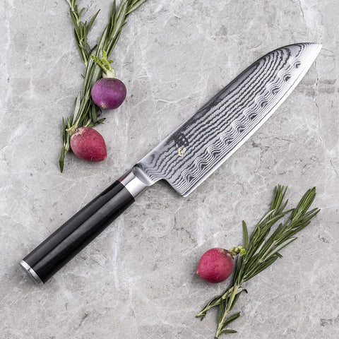 Image of Classic 7” Hollow-Ground Santoku All-Purpose Kitchen Knife; VG-MAX Blade Steel and Ebony Pakkawood Handle; Hollow-Ground Indentations for Reduced Friction and Smoother Cuts; Handcrafted in Japan